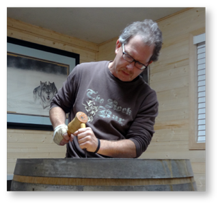 John Koester Originals - John carving a wine keg for Stones Throw Winery